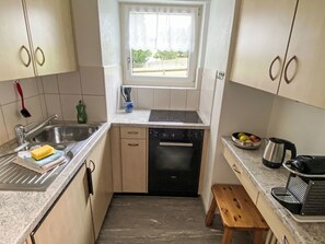 Fridge, oven, cookware/dishes/utensils