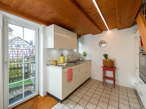 Fridge, oven, dishwasher, cookware/dishes/utensils