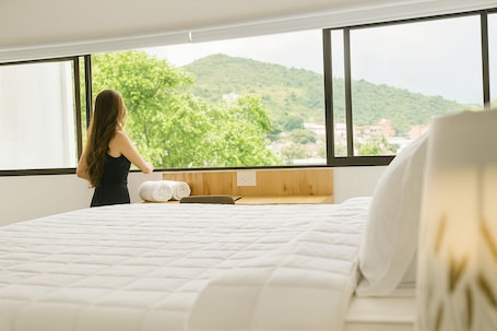 Luxury Suite, Patio, Hill View | Desk, laptop workspace, iron/ironing board, free WiFi. Riviera Hotel Boutique