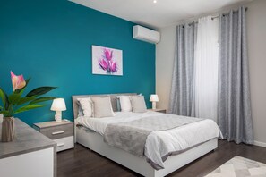 Căn hộ, 3 phòng ngủ, quang cảnh vườn | Màn/rèm cản sáng, bàn ủi/dụng cụ ủi quần áo