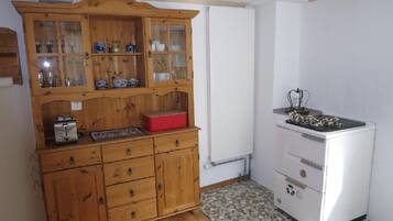 Fridge, microwave, oven, cookware/dishes/utensils