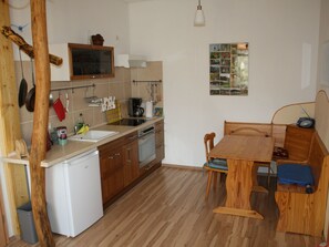 Fridge, oven, cookware/dishes/utensils