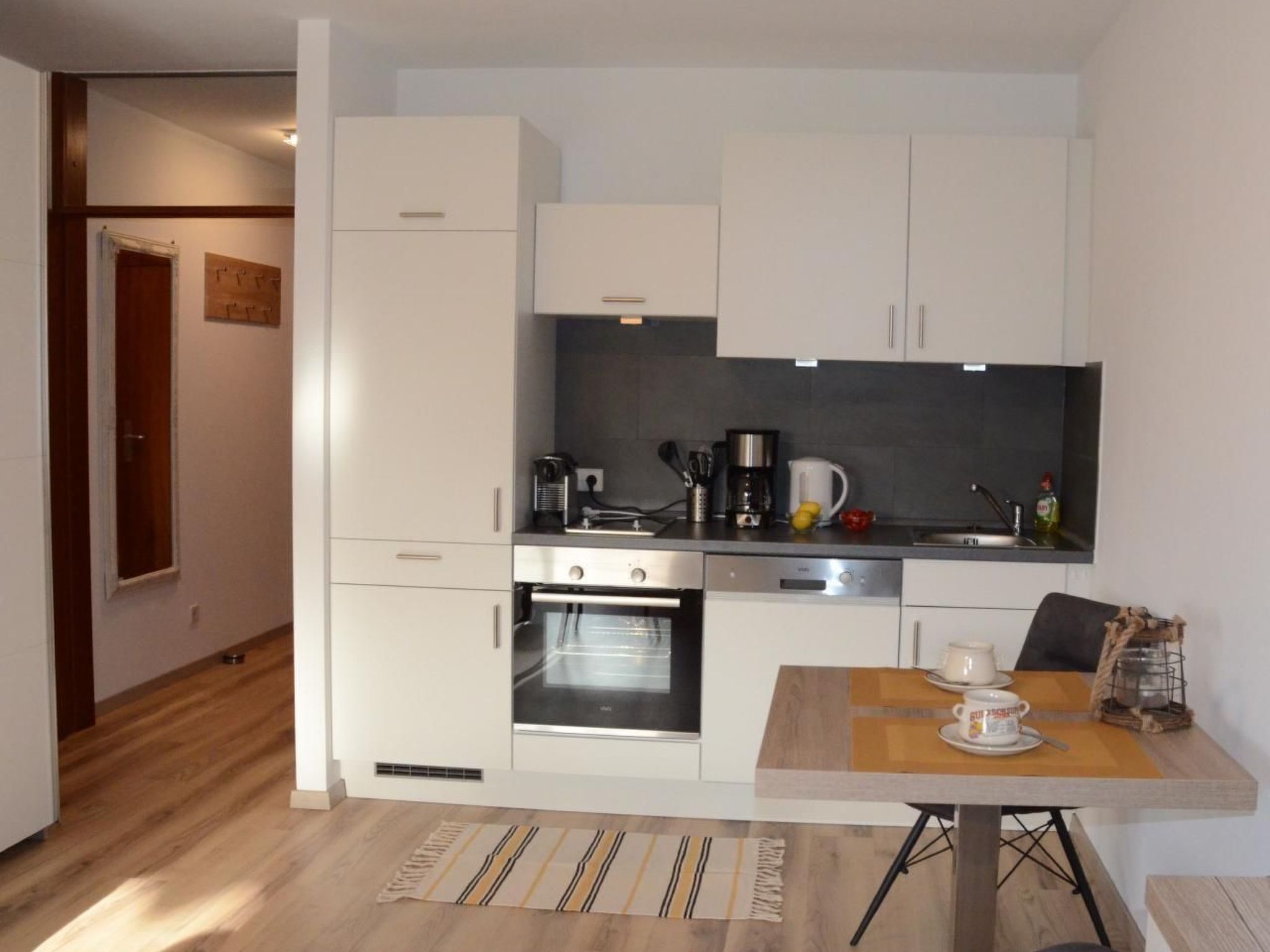 Fridge, oven, dishwasher, cookware/dishes/utensils