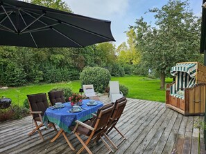 Outdoor dining - Gutshofambiente 1 by Interhome (Stockelsdorf)