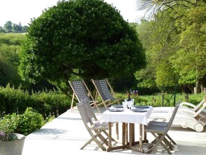 Outdoor dining - Maison la Boulangerie in Saint-Étienne-en-Coglès by Interhome (St Brice en Coglès)