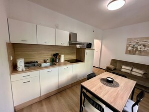 Fridge, cookware/dishes/utensils - Wohnung in Dramalj mit Garten, Terrasse und Grill by Interhome (Crikvenica/Dramalj)