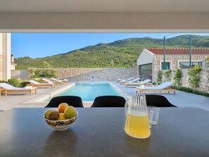 A heated pool - Ferienvilla "Lovorika" by Interhome (Cista Provo)