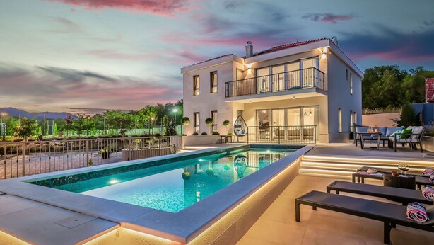 A modern two-story building with a swimming pool and outdoor seating area. - in Dugopolje mit Privatem Pool by Interhome (Dugopolje)