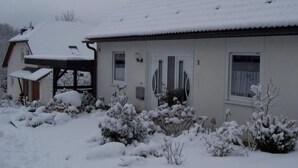 A house with a snow-covered roof and a number '3' on the door. - Fe.Wo.Renate Ebach by Interhome (Alf)