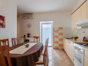 Fridge, oven, cookware/dishes/utensils