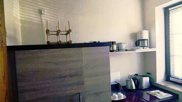 Fridge, oven, cookware/dishes/utensils