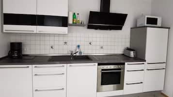 Fridge, microwave, oven, cookware/dishes/utensils