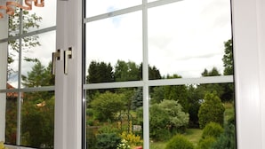 A window with a view of a garden. - Apartment Dorle by Interhome (Benneckenstein)
