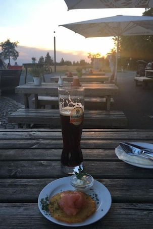 Outdoor dining. Berg- und Seeblick am Hillebachsee by Interhome