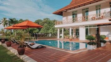 Outdoor pool, pool umbrellas, pool loungers