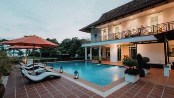 Outdoor pool, pool umbrellas, pool loungers