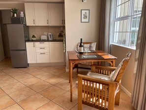 Fridge, microwave, cookware/dishes/utensils