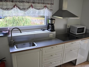 Fridge, microwave, cookware/dishes/utensils