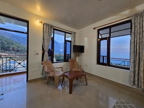 Deluxe Double Room, Balcony, Mountain View | Iron/ironing board, free WiFi - East Home Stay (Dharamshala)