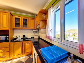 Fridge, microwave, oven, cookware/dishes/utensils - Domus Dino by Interhome (Madeira/Porto da Cruz)