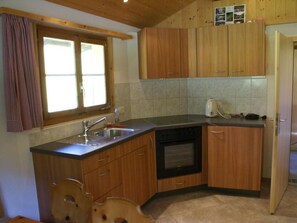 Fridge, oven, cookware/dishes/utensils