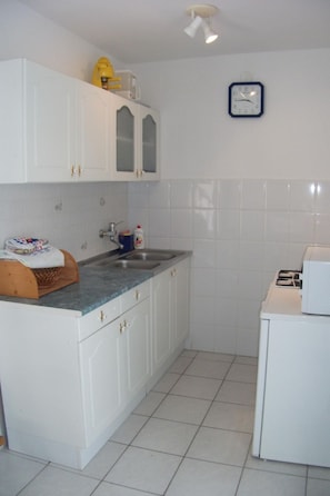 Fridge, microwave, cookware/dishes/utensils