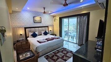 Premium bedding, desk, laptop workspace, soundproofing