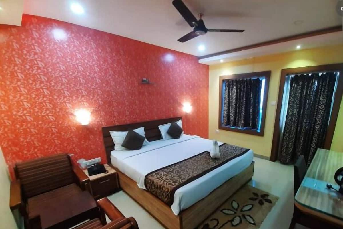 Premium bedding, desk, laptop workspace, soundproofing