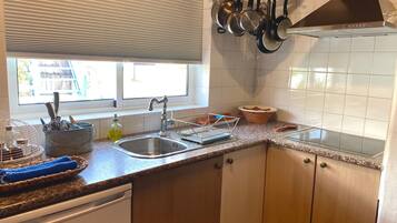 Fridge, microwave, cookware/dishes/utensils