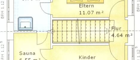Plano de planta que muestra un baño, una cocina, una sala de estar, un comedor y una habitación infantil.