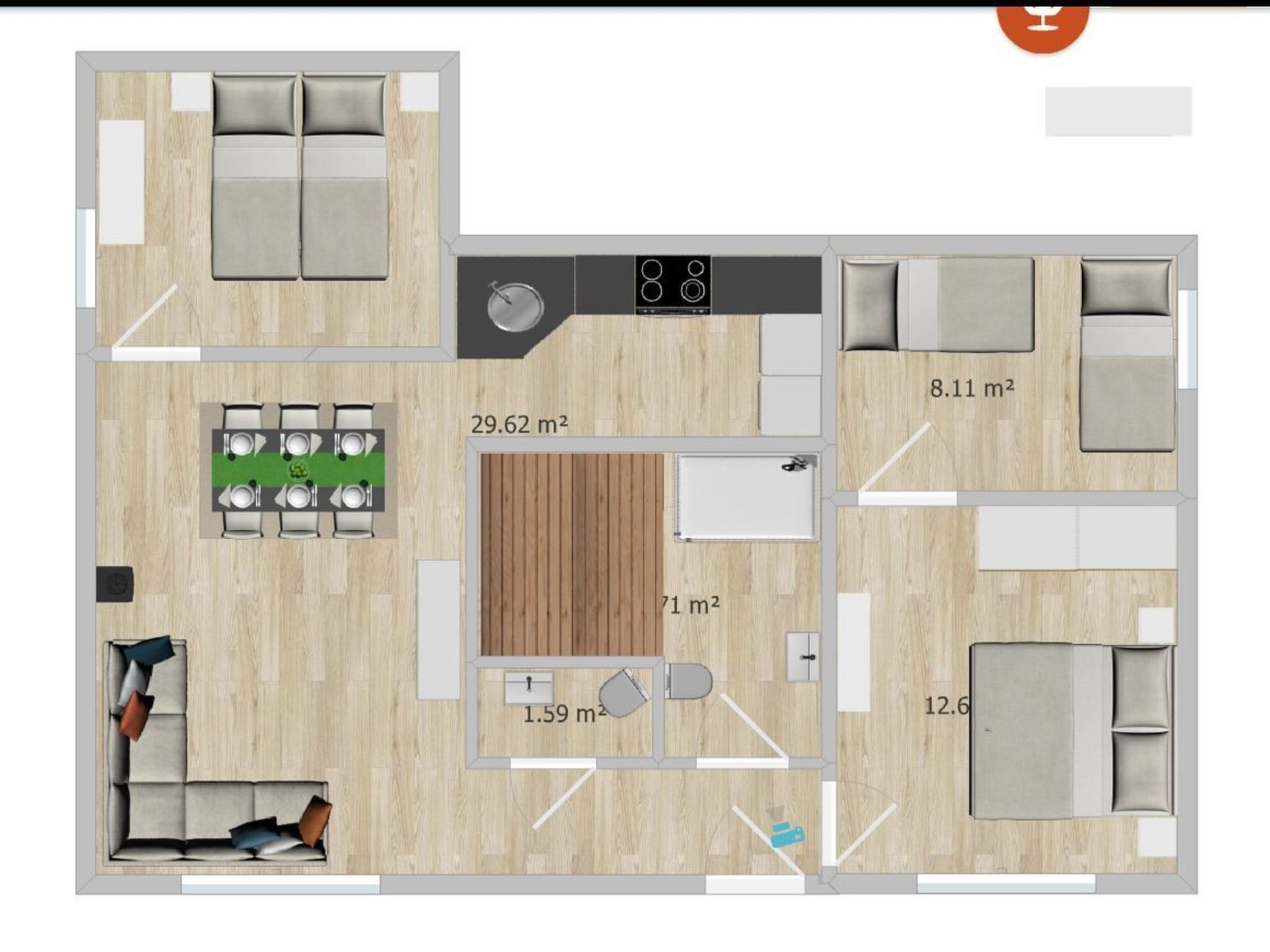 A floor plan of a hotel room with a living area, a dining space, a kitchenette, and a bathroom.