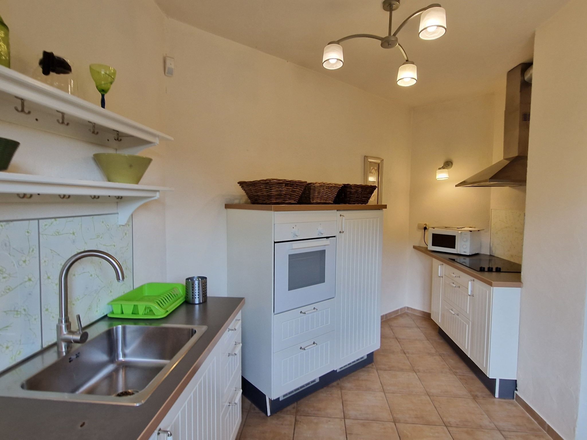 Fridge, microwave, cookware/dishes/utensils