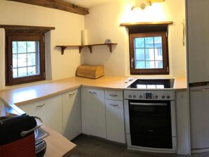 Fridge, oven, cookware/dishes/utensils