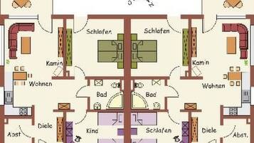 Een plattegrond van een hotelkamer met twee slaapkamers, twee badkamers, een keuken, een eethoek en een woonkamer.