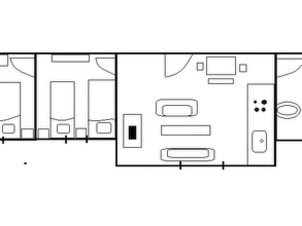 A hotel room layout with a bed, a desk, a chair, a wardrobe, and a bathroom.