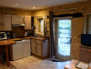 Fridge, microwave, dishwasher, cookware/dishes/utensils