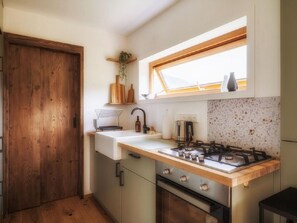 Fridge, oven, cookware/dishes/utensils