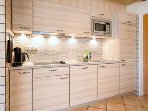 Fridge, microwave, dishwasher, cookware/dishes/utensils
