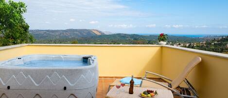 Bañera de hidromasaje al aire libre