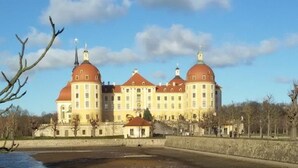 A large, historic building with two prominent domes and a symmetrical facade. - Ferienwohznung Huhle by Interhome (Rabenau)
