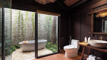 Luxury Bungalow, Garden View | Desk, blackout drapes, soundproofing, iron/ironing board