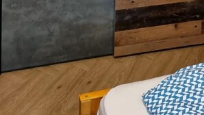 A room with a grey tiled wall and a wooden panel wall. - Chalt "Arve" by Interhome (Riederalp)