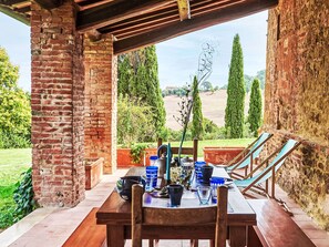 Outdoor dining - "Gelsomino casteltt" by Interhome (Torrita di Siena)