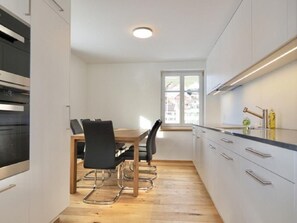 Fridge, dishwasher, cookware/dishes/utensils - Rhänstrasse 9 in Gais AR by Interhome (Gais)
