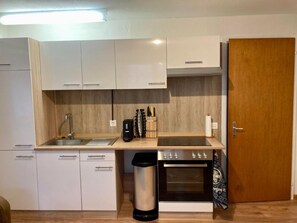Fridge, oven, cookware/dishes/utensils - Haus am Bach by Interhome (Wildhaus)