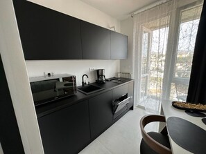 Fridge, microwave, oven, dishwasher - Fiorino Apartment-Studio Rijeka mit Balkon by Interhome (Rijeka)