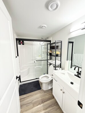 Hair dryer, towels, soap, toilet paper