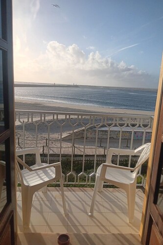 Mit den Füßen im Sand by Interhome