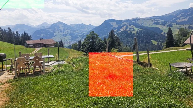 A rural landscape with a view of mountains, a wooden cabin, and a dining area with outdoor seating. - Ferienwohnung mit Bergpanorama by Interhome (Zweisimmen)