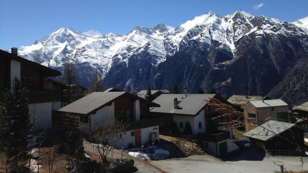A mountain village with snow-covered peaks in the background. - Gentiana Haus B by Interhome (Grächen)